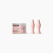 Curam Face Cup Mini i ljusrosa silikon visad med minimalistisk förpackning, som visar två små ansiktskoppningsverktyg utformade för känsliga områden och lymfdränage.