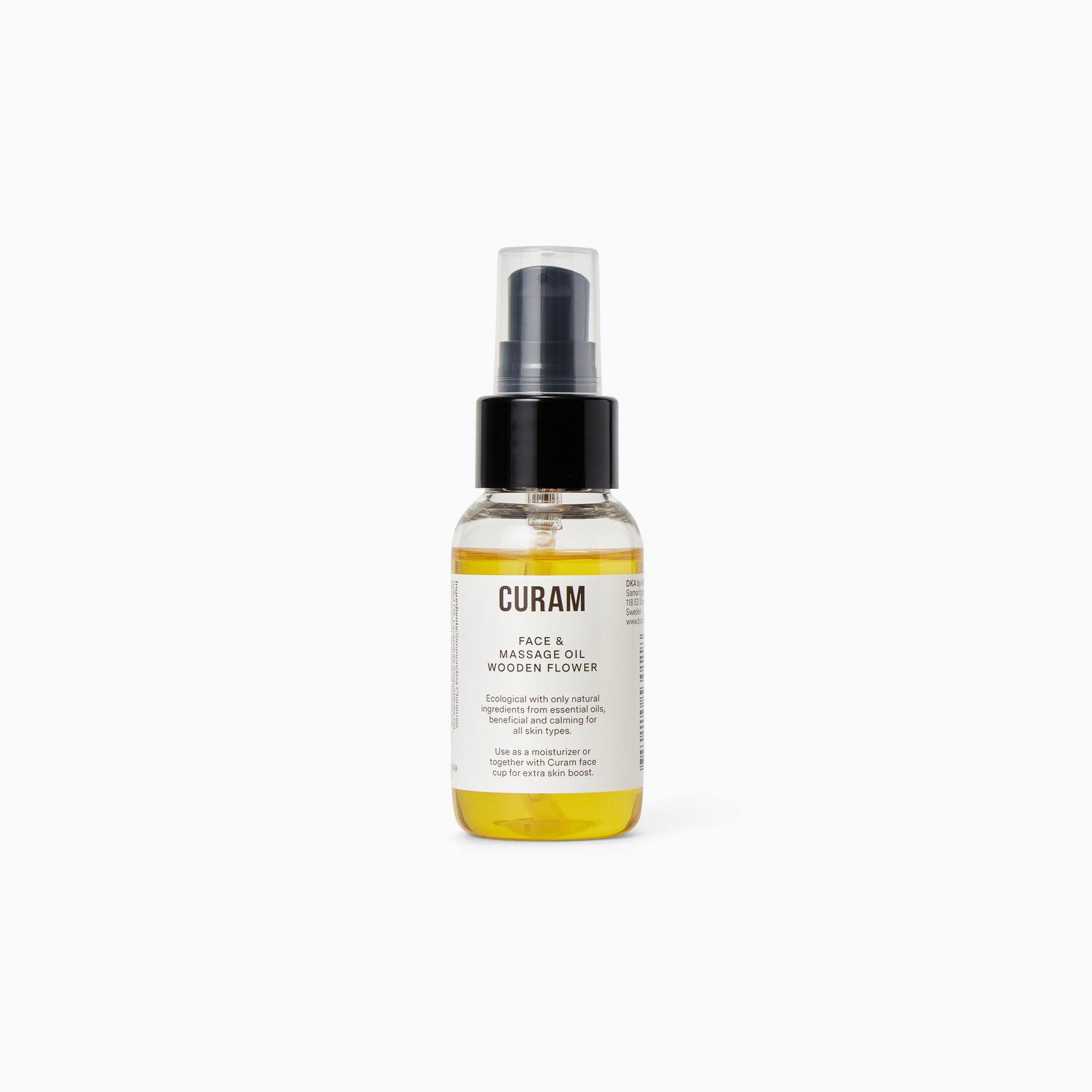 A clear bottle of Curam Face Oil with a black pump dispenser, featuring golden lightweight oil designed for facial cupping and daily massage, suitable for all skin types.